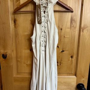 Bronte cream sleeveless dress. Material has a suede feel